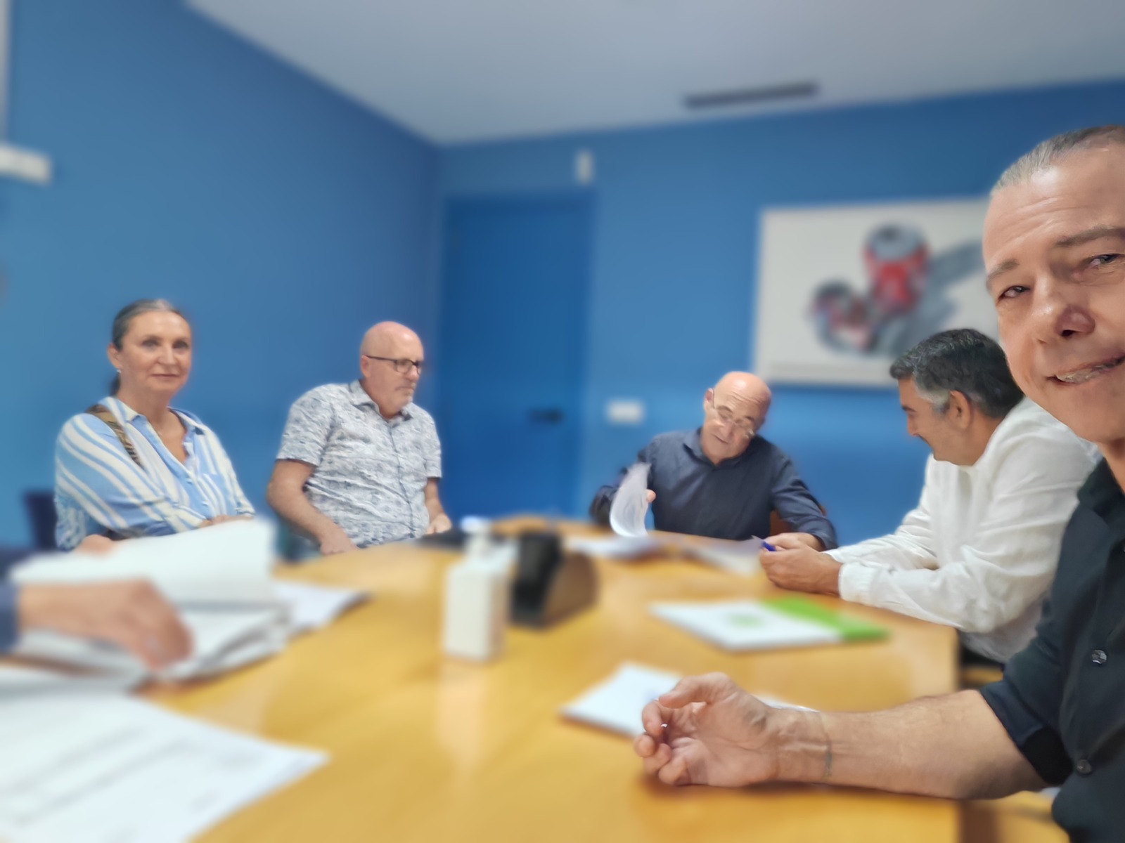 Nicolas Strebel reviewing documents with clients